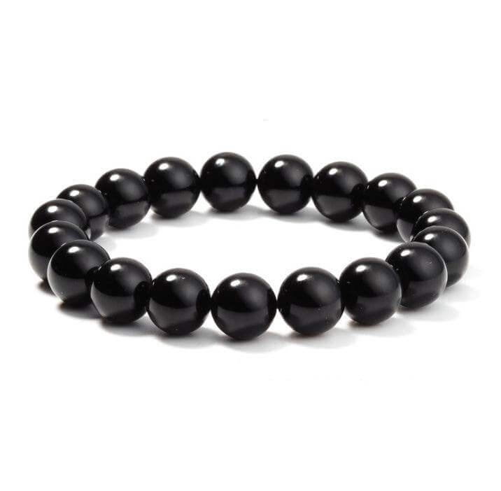 Black Onyx BraceletExperience the power of the Black Onyx Bracelet. Made with an imported elastic cord and featuring 8MM geometric black agate beads, this bracelet is not just stylish BraceletPlush Fashions ShopPlush Fashion ShopBlack Onyx Bracelet