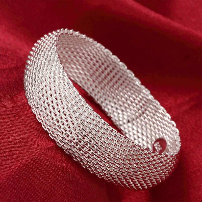 Women's silver mesh braceletIndulge in elegance with our Women's Silver Mesh Bracelet. Crafted with environmentally friendly copper and plated with 925 silver, this dazzling bracelet features aBraceletPlush Fashions ShopPlush Fashion Shopsilver mesh bracelet