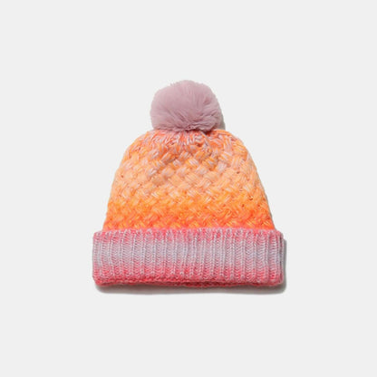 Gradient Knit Hat with PompomStay warm and stylish with our Gradient Knit Hat with Pompom! Made with a soft and cozy blend of acrylic and polyester, this imported hat is the perfect addition to HatPlush Fashion ShopPlush Fashion ShopGradient Knit Hat