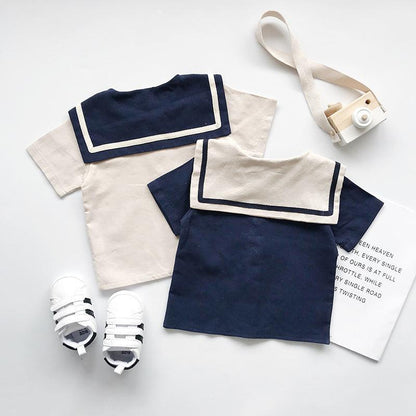 Boys and girls Navy solid short sleeves setsGear up for summer with our boys and girls Navy solid short-sleeved sets! Made with 90% cotton, these two-piece pants suits are perfect for both boys and girls. Say Infant setsPlush Fashions ShopPlush Fashion Shopgirls Navy solid short sleeves sets