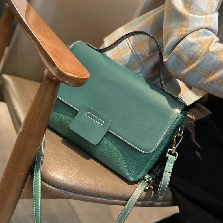 Leather Handbags New Style Single-shoulder Messenger BagThis leather handbag is a must-have for any fashion-forward individual. Made with high-quality leather, it exudes a retro vibe with its belt decoration and car stitcHandbagsPlush Fashions ShopPlush Fashion ShopLeather Handbags