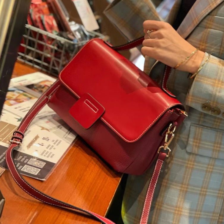 Leather Handbags New Style Single-shoulder Messenger BagThis leather handbag is a must-have for any fashion-forward individual. Made with high-quality leather, it exudes a retro vibe with its belt decoration and car stitcHandbagsPlush Fashions ShopPlush Fashion ShopLeather Handbags