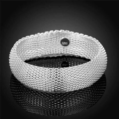 Women's silver mesh braceletIndulge in elegance with our Women's Silver Mesh Bracelet. Crafted with environmentally friendly copper and plated with 925 silver, this dazzling bracelet features aBraceletPlush Fashions ShopPlush Fashion Shopsilver mesh bracelet