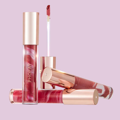 PHOFAY Rose Blooming Hydrating Lip Gloss in elegant rose-gold packaging.