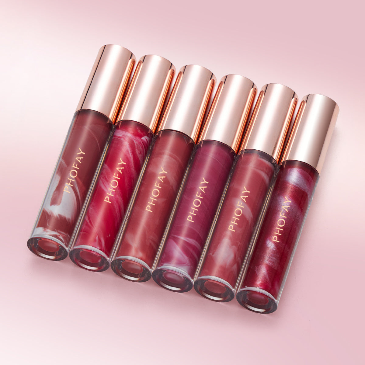 PHOFAY Rose Blooming Hydrating Lip Gloss collection with rose gold caps.