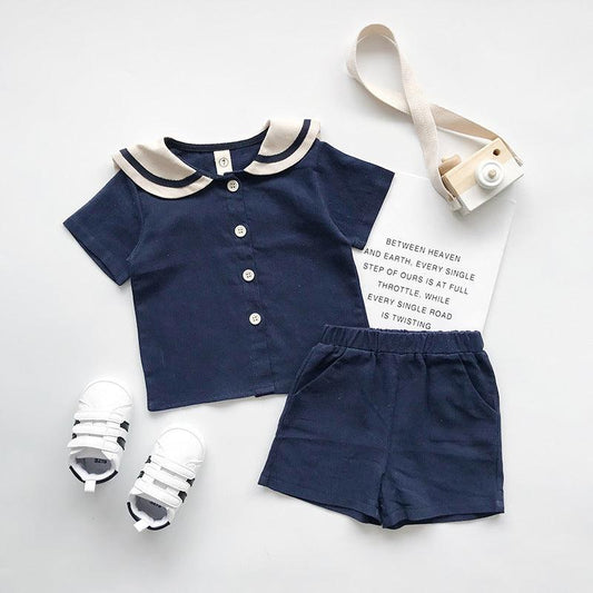 Boys and girls Navy solid short sleeves setsGear up for summer with our boys and girls Navy solid short-sleeved sets! Made with 90% cotton, these two-piece pants suits are perfect for both boys and girls. Say Infant setsPlush Fashions ShopPlush Fashion Shopgirls Navy solid short sleeves sets