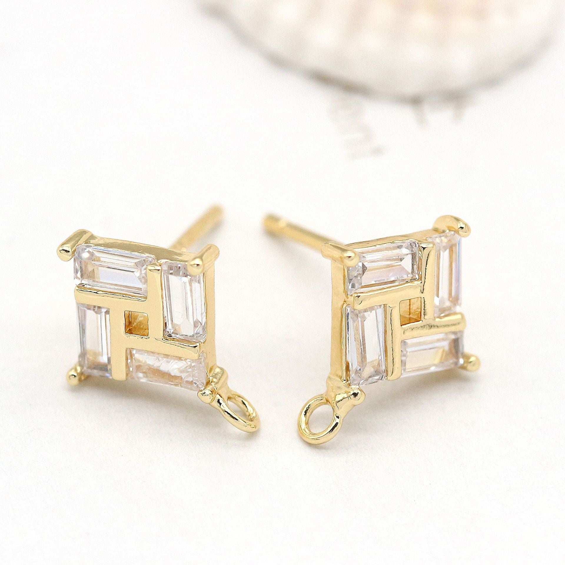 Stone Plated 14K Real Gold EarringsExperience the luxurious beauty of our Stone Plated 14K Real Gold Earrings. The mirror polishing technology and hand-polished 925 silver needle ensure excellent shinearingsPlush Fashions ShopPlush Fashion ShopStone Plated 14K Real Gold Earrings