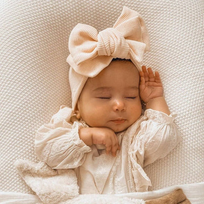 Infant Oversized Bow Hair BandAdd the perfect finishing touch to your little one's outfit with our Infant Oversized Bow Hair Band. Made with high-quality fabric and crafted with knitting technolohead bandPlush Fashions ShopPlush Fashion ShopInfant Oversized Bow Hair Band