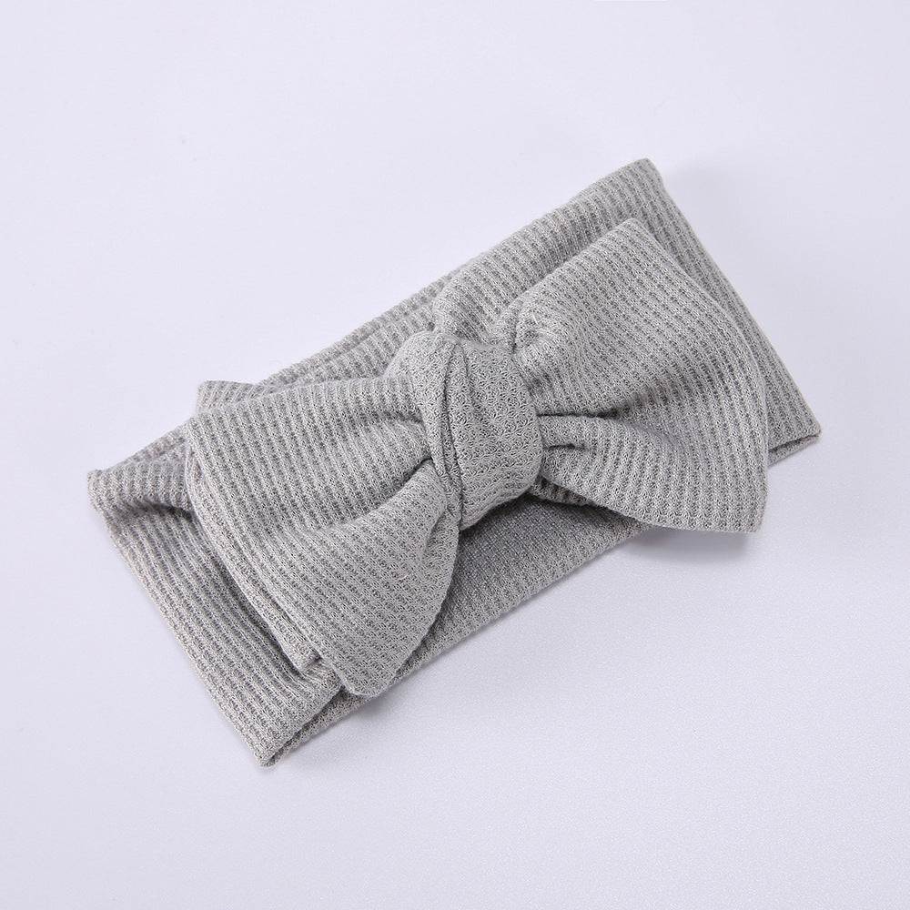 Infant Oversized Bow Hair BandAdd the perfect finishing touch to your little one's outfit with our Infant Oversized Bow Hair Band. Made with high-quality fabric and crafted with knitting technolohead bandPlush Fashions ShopPlush Fashion ShopInfant Oversized Bow Hair Band