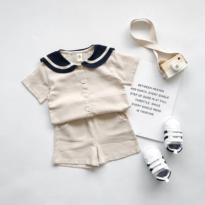 Boys and girls Navy solid short sleeves setsGear up for summer with our boys and girls Navy solid short-sleeved sets! Made with 90% cotton, these two-piece pants suits are perfect for both boys and girls. Say Infant setsPlush Fashions ShopPlush Fashion Shopgirls Navy solid short sleeves sets