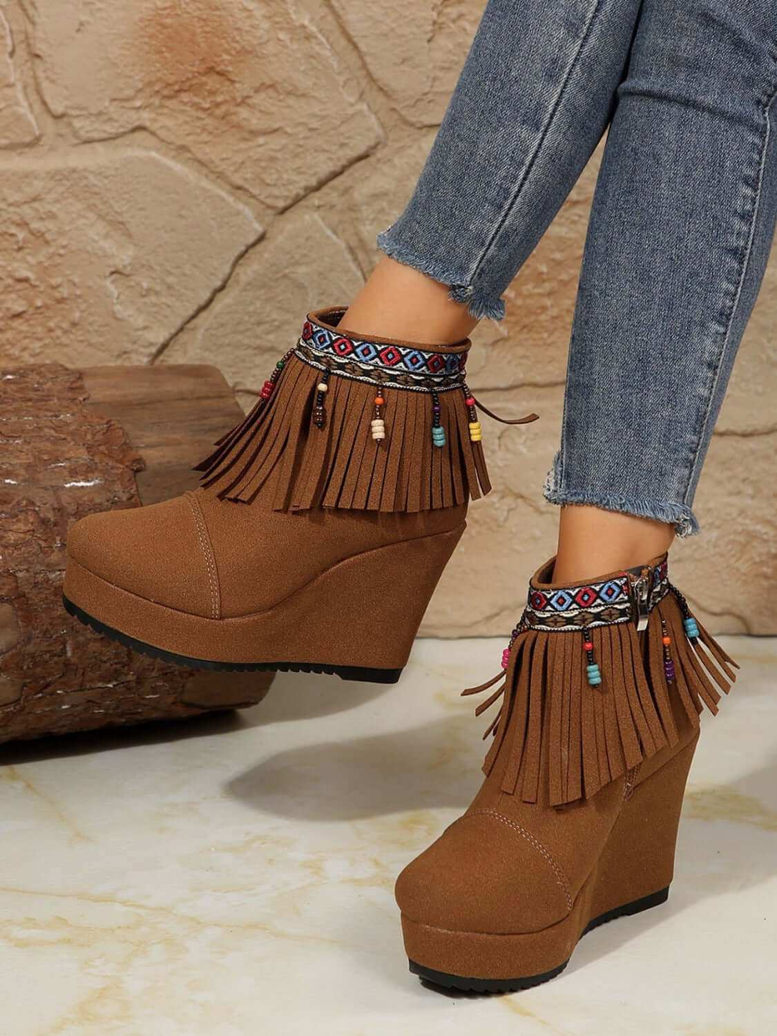 Fringe Suede Wedge BootsElevate your style with these Fringe Suede Wedge Boots! Crafted with high-quality elastomer and suede, these boots provide comfort and durability. With a heel heightShoesPlush Fashion ShopPlush Fashion ShopFringe Suede Wedge Boots