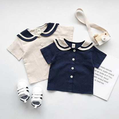 Boys and girls Navy solid short sleeves setsGear up for summer with our boys and girls Navy solid short-sleeved sets! Made with 90% cotton, these two-piece pants suits are perfect for both boys and girls. Say Infant setsPlush Fashions ShopPlush Fashion Shopgirls Navy solid short sleeves sets