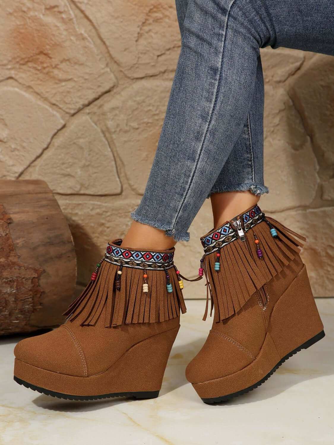 Fringe Suede Wedge BootsElevate your style with these Fringe Suede Wedge Boots! Crafted with high-quality elastomer and suede, these boots provide comfort and durability. With a heel heightShoesPlush Fashion ShopPlush Fashion ShopFringe Suede Wedge Boots