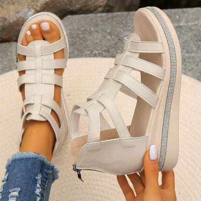 Cutout Rhinestone Trim Wedge SandalsElevate your style with our Cutout Rhinestone Trim Wedge Sandals! These comfortable flats feature a wedge heel that adds height without sacrificing comfort. Made witShoesPlush Fashion ShopPlush Fashion ShopCutout Rhinestone Trim Wedge Sandals