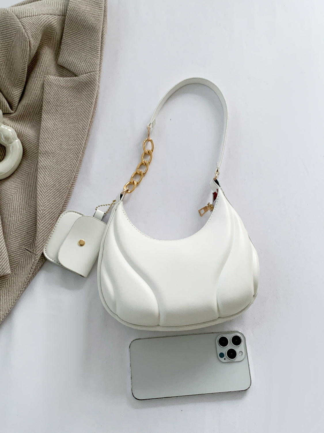 PU Leather Shoulder Bag with EarPods BagCarry your essentials in style with our PU Leather Shoulder Bag! Made from imported PU leather, this medium-sized bag is perfect for day-to-day use. The spacious intHand bagPlush Fashion ShopPlush Fashion ShopPU Leather Shoulder Bag