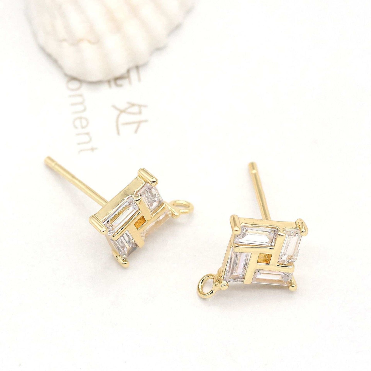 Stone Plated 14K Real Gold EarringsExperience the luxurious beauty of our Stone Plated 14K Real Gold Earrings. The mirror polishing technology and hand-polished 925 silver needle ensure excellent shinearingsPlush Fashions ShopPlush Fashion ShopStone Plated 14K Real Gold Earrings