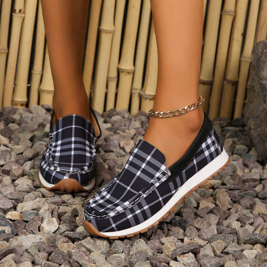 Plaid Round Toe Slip-OnsStep into comfort and style with our Plaid Round Toe Slip-Ons! Made with durable elastomer and soft polyester material, these flats provide all-day support and a snuShoesPlush Fashion ShopPlush Fashion ShopPlaid Round Toe Slip-Ons