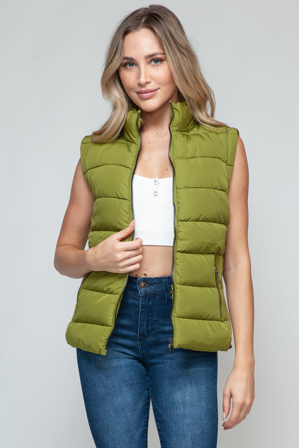 Snobbish Zip Up Turtleneck Vest with PocketsComplete your wardrobe with our Snobbish Zip Up Turtleneck Vest! With a stylish zip-up front and cozy turtleneck, this vest offers both fashion and warmth. The additCoatsPlush Fashion ShopPlush Fashion ShopSnobbish Zip