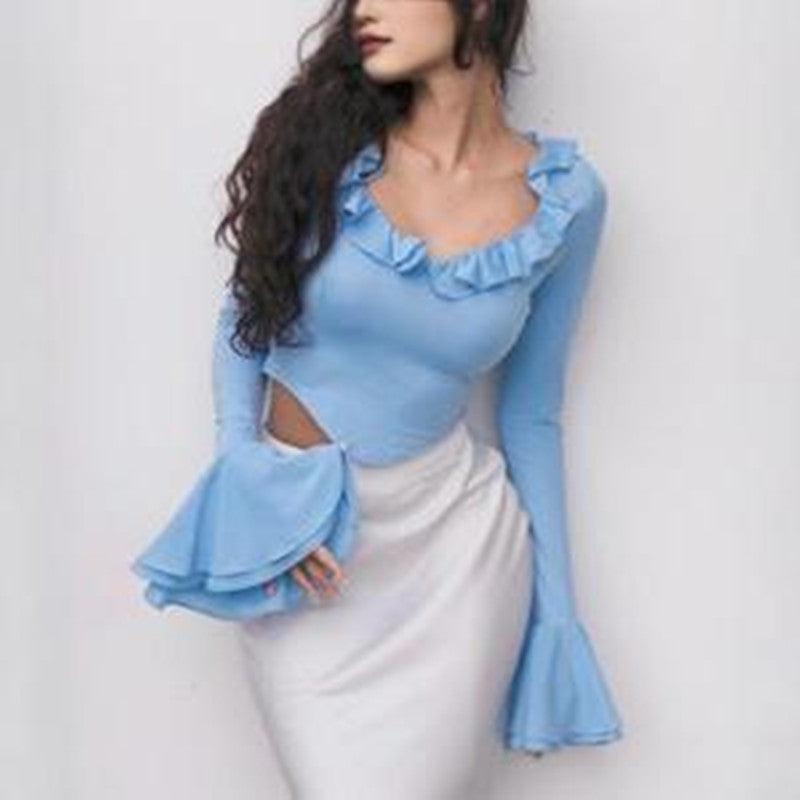 Fashion Women's Wear Ruffled Flared Sleeve TopElevate your wardrobe with our Fashion Women's Wear Ruffled Flared Sleeve Top! Made from soft and durable polyester, this top comes in a beautiful blue color and a sShirtPlush Fashions ShopPlush Fashion ShopWear Ruffled Flared Sleeve Top