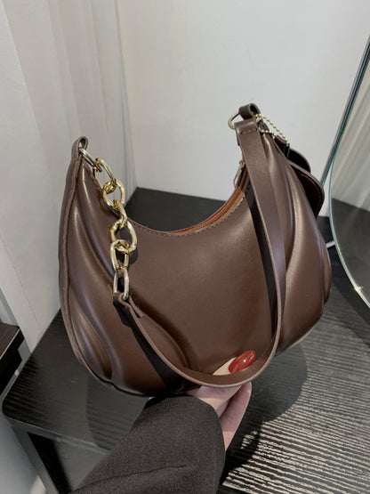 PU Leather Shoulder Bag with EarPods BagCarry your essentials in style with our PU Leather Shoulder Bag! Made from imported PU leather, this medium-sized bag is perfect for day-to-day use. The spacious intHand bagPlush Fashion ShopPlush Fashion ShopPU Leather Shoulder Bag