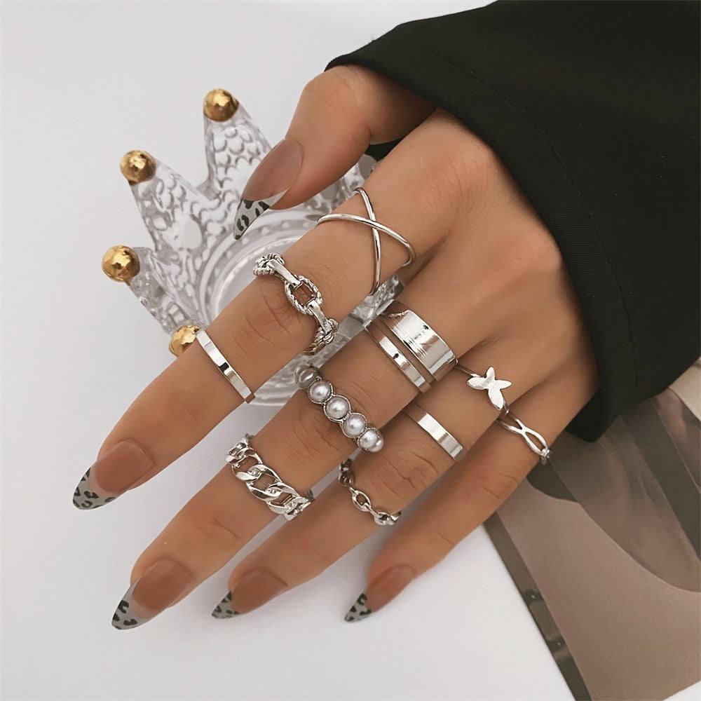 Women's Butterfly Pearl Ring 10-piece Metal Dripping Pearl RingWomen's Butterfly Pearl Ring 10-piece Metal Dripping Pearl Ring is a must-have for the fashion-forward woman. The 10-piece metal dripping pearl ring set is electroplRingPlush Fashions ShopPlush Fashion ShopWomen'