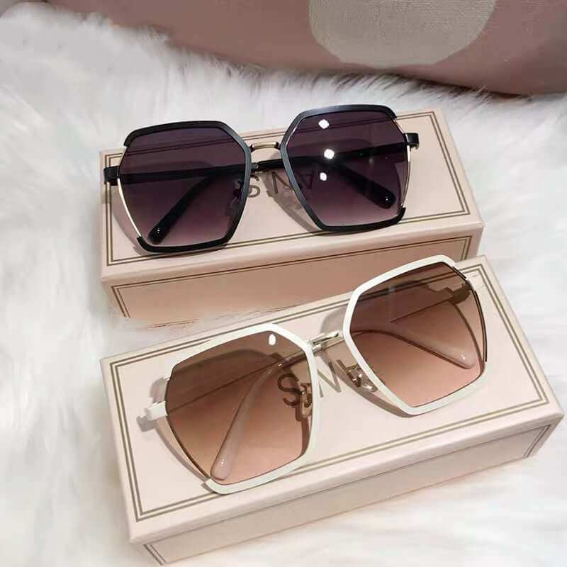 Vintage Half-Frame SunglassesExperience the vintage charm and style of our Half-Frame Sunglasses! Made with high-quality metal, these shades provide both sun protection and a touch of elegance. SunglassesPlush Fashions ShopPlush Fashion ShopVintage Half-Frame Sunglasses