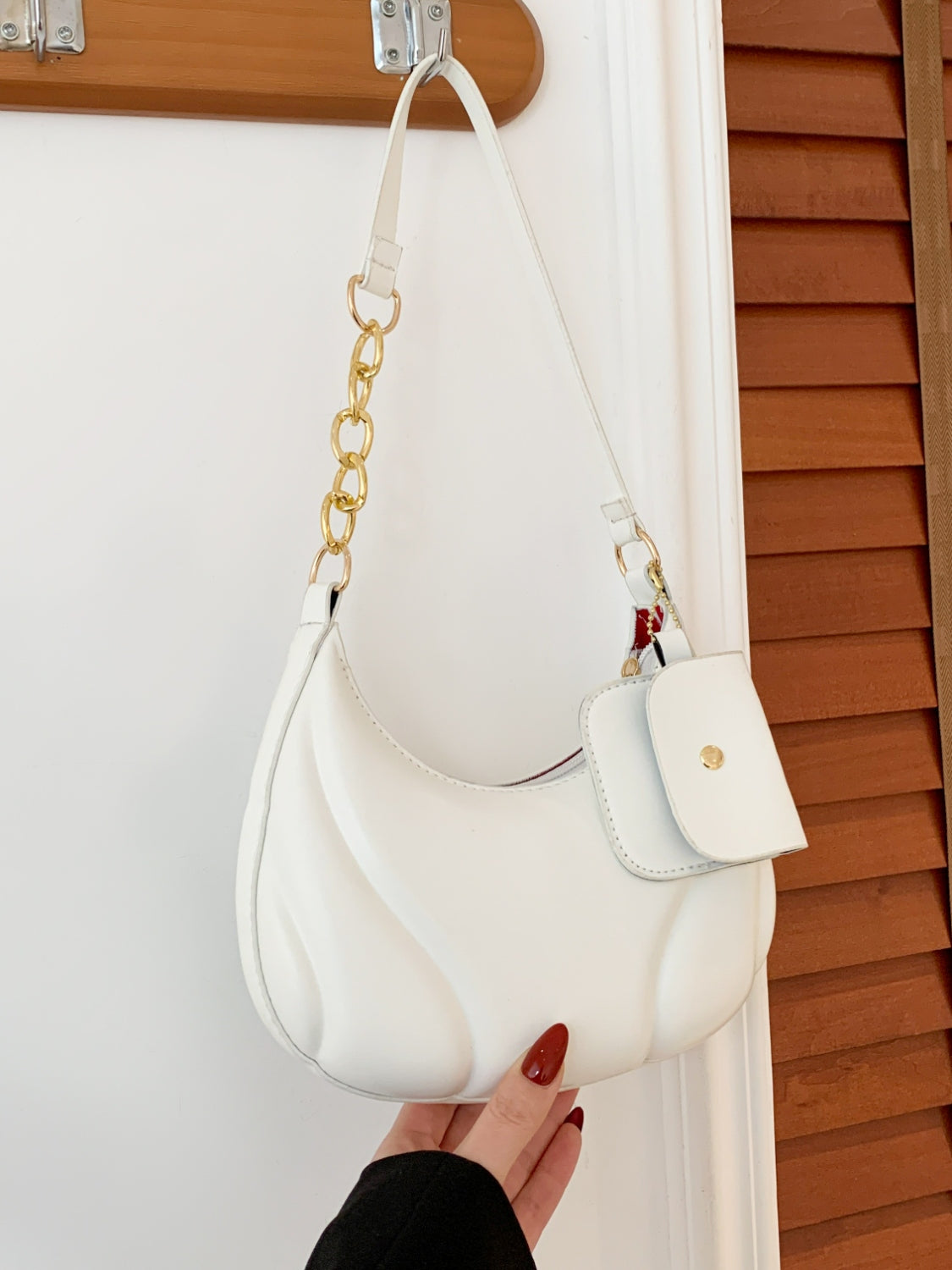 PU Leather Shoulder Bag with EarPods BagCarry your essentials in style with our PU Leather Shoulder Bag! Made from imported PU leather, this medium-sized bag is perfect for day-to-day use. The spacious intHand bagPlush Fashion ShopPlush Fashion ShopPU Leather Shoulder Bag