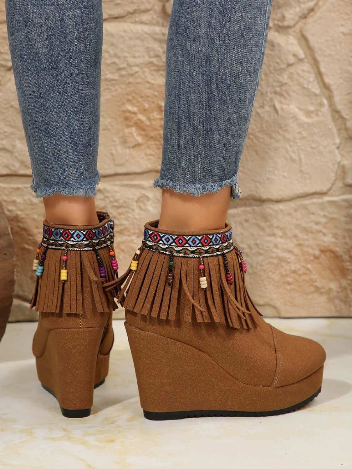 Fringe Suede Wedge BootsElevate your style with these Fringe Suede Wedge Boots! Crafted with high-quality elastomer and suede, these boots provide comfort and durability. With a heel heightShoesPlush Fashion ShopPlush Fashion ShopFringe Suede Wedge Boots