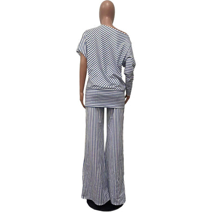 Women's Casual Asymmetric Sleeve Shirt with Pant SetUnleash your inner fashionista with our Volunteer fabric Casual Sleeve Asymmetric Shoulder Suit! This bold and unique suit features a stripe and plaid pattern in whi2 piece Pants setPlush Fashions ShopPlush Fashion ShopCasual Asymmetric Sleeve Shirt