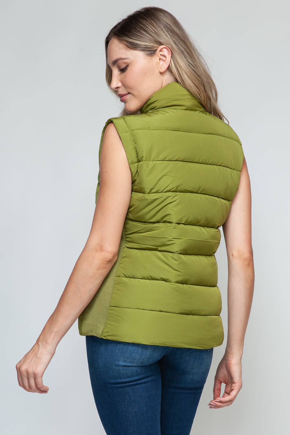 Snobbish Zip Up Turtleneck Vest with PocketsComplete your wardrobe with our Snobbish Zip Up Turtleneck Vest! With a stylish zip-up front and cozy turtleneck, this vest offers both fashion and warmth. The additCoatsPlush Fashion ShopPlush Fashion ShopSnobbish Zip