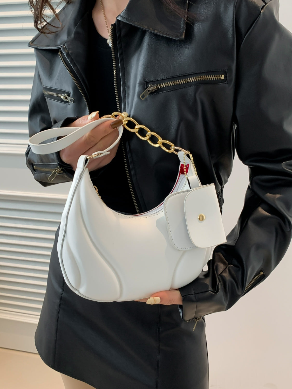 PU Leather Shoulder Bag with EarPods BagCarry your essentials in style with our PU Leather Shoulder Bag! Made from imported PU leather, this medium-sized bag is perfect for day-to-day use. The spacious intHand bagPlush Fashion ShopPlush Fashion ShopPU Leather Shoulder Bag