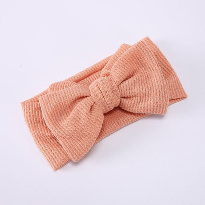 Infant Oversized Bow Hair BandAdd the perfect finishing touch to your little one's outfit with our Infant Oversized Bow Hair Band. Made with high-quality fabric and crafted with knitting technolohead bandPlush Fashions ShopPlush Fashion ShopInfant Oversized Bow Hair Band