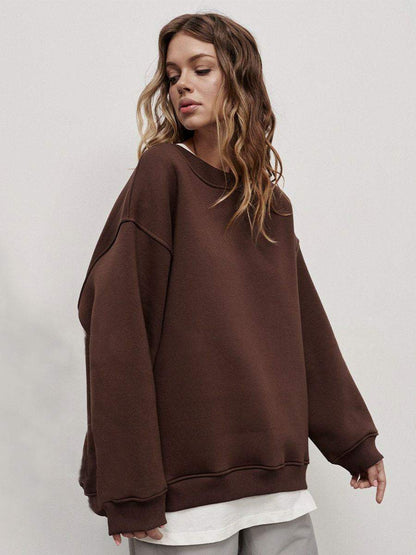 Women's Solid Color Loose SweaterStay cozy and stylish with our Solid Color Loose Sweater. Available in a variety of colors and sizes, the loose fit and conventional sleeves provide both comfort andsweatersPlush Fashions ShopPlush Fashion ShopSolid Color Loose Sweater European