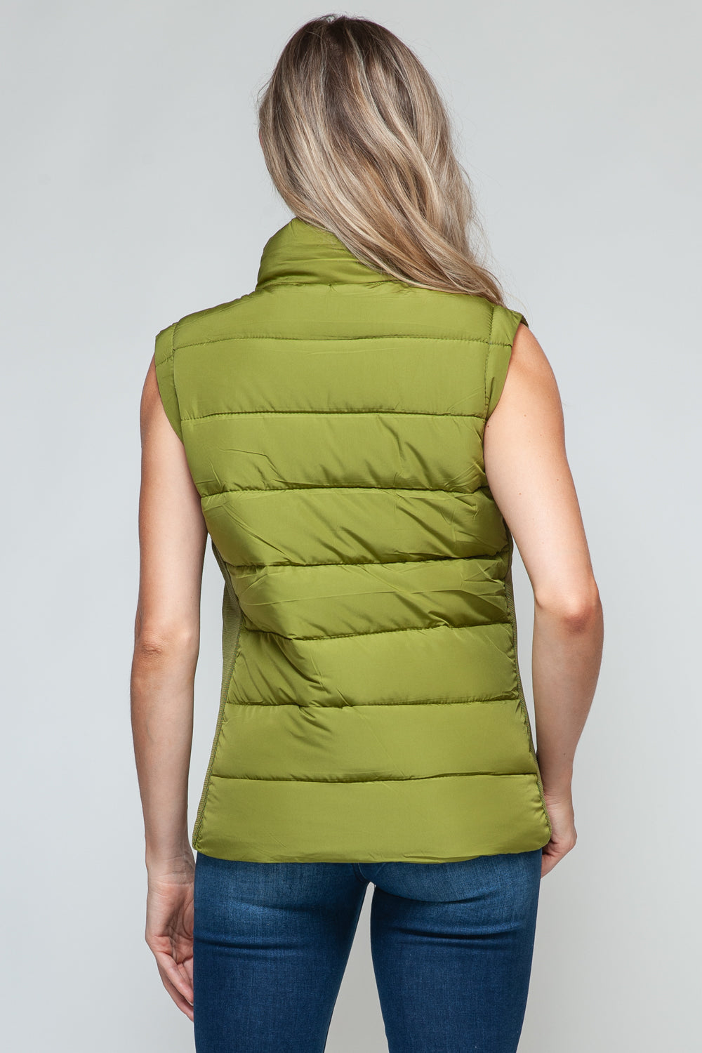 Snobbish Zip Up Turtleneck Vest with PocketsComplete your wardrobe with our Snobbish Zip Up Turtleneck Vest! With a stylish zip-up front and cozy turtleneck, this vest offers both fashion and warmth. The additCoatsPlush Fashion ShopPlush Fashion ShopSnobbish Zip