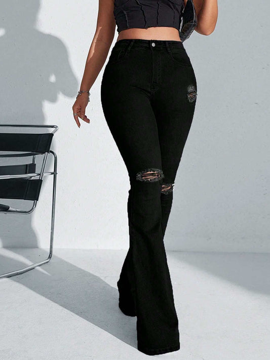 Ladies High Waist Ripped Flare Leg JeansElevate your denim game with our Ladies High Waist Ripped Flare Leg Jeans. Designed for the fashion-forward woman, these jeans make a statement with their black coloPantsPlush Fashions ShopPlush Fashion ShopLadies High Waist Ripped Flare Leg Jeans