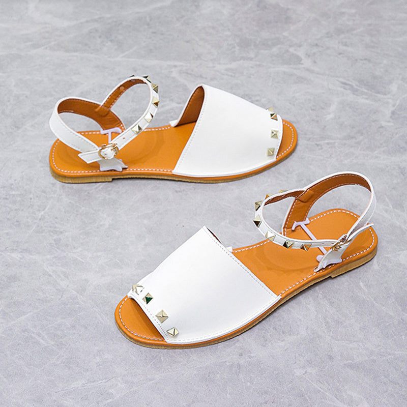 Rivet Sandals Summer Fish Mouth Shoes For Women Flat Beach ShoesElevate your summer shoe game with our Rivet Sandals! These Roman style sandals feature a comfortable fish mouth toe shape and a shallow mouth design. The frosted prSandalsPlush Fashions ShopPlush Fashion ShopRivet Sandals Summer Fish Mouth Shoes