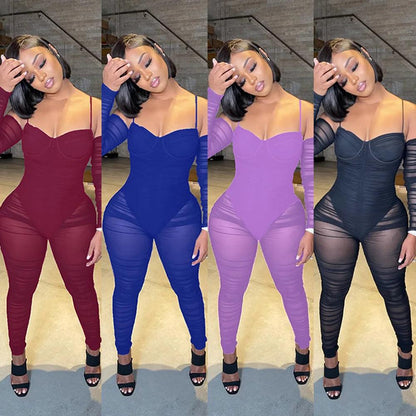 Women's Sheer Mesh Patchwork Romper Jumpsuit with Long SleeveThis women's romper jumpsuit features a trendy sheer mesh patchwork design on the bodice and sleeves, perfect for a chic and modern look. The long sleeves add a toucRomperPlush Fashions ShopPlush Fashion ShopSheer Mesh Patchwork Romper Jumpsuit