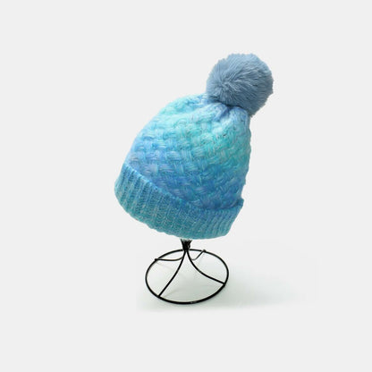 Gradient Knit Hat with PompomStay warm and stylish with our Gradient Knit Hat with Pompom! Made with a soft and cozy blend of acrylic and polyester, this imported hat is the perfect addition to HatPlush Fashion ShopPlush Fashion ShopGradient Knit Hat